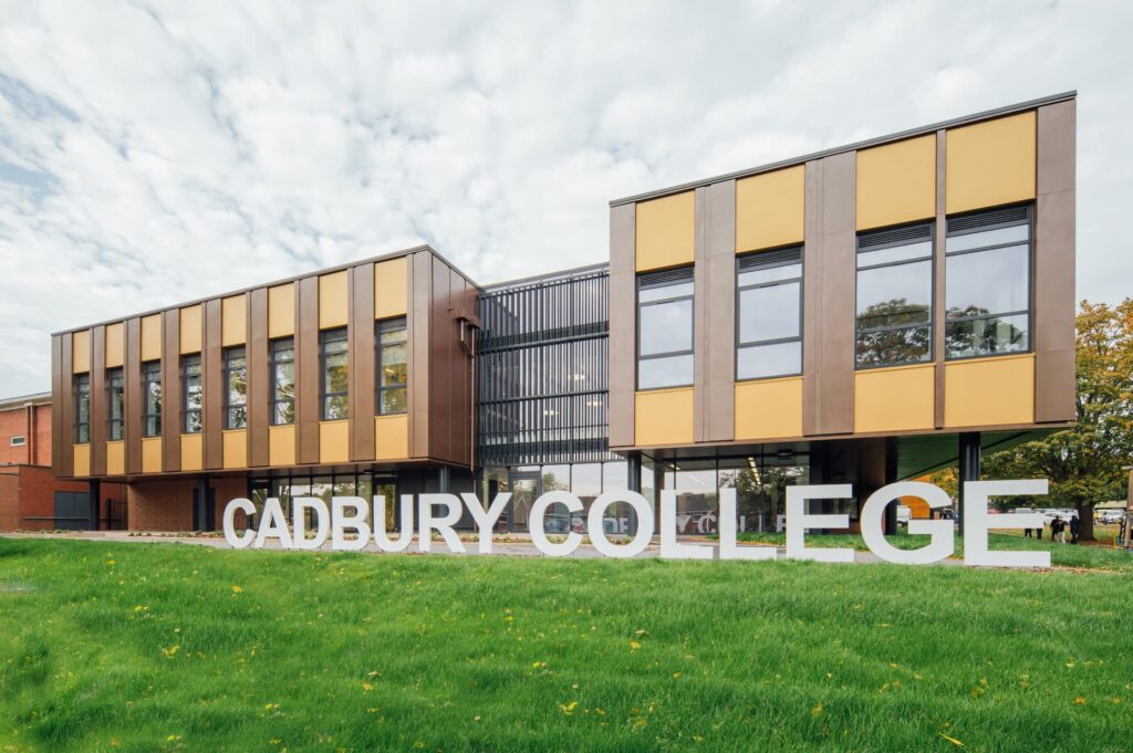 New STEM building with Cadbury College white letter sign in foreground
