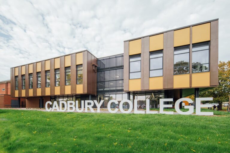 New STEM building with Cadbury College white letter sign in foreground