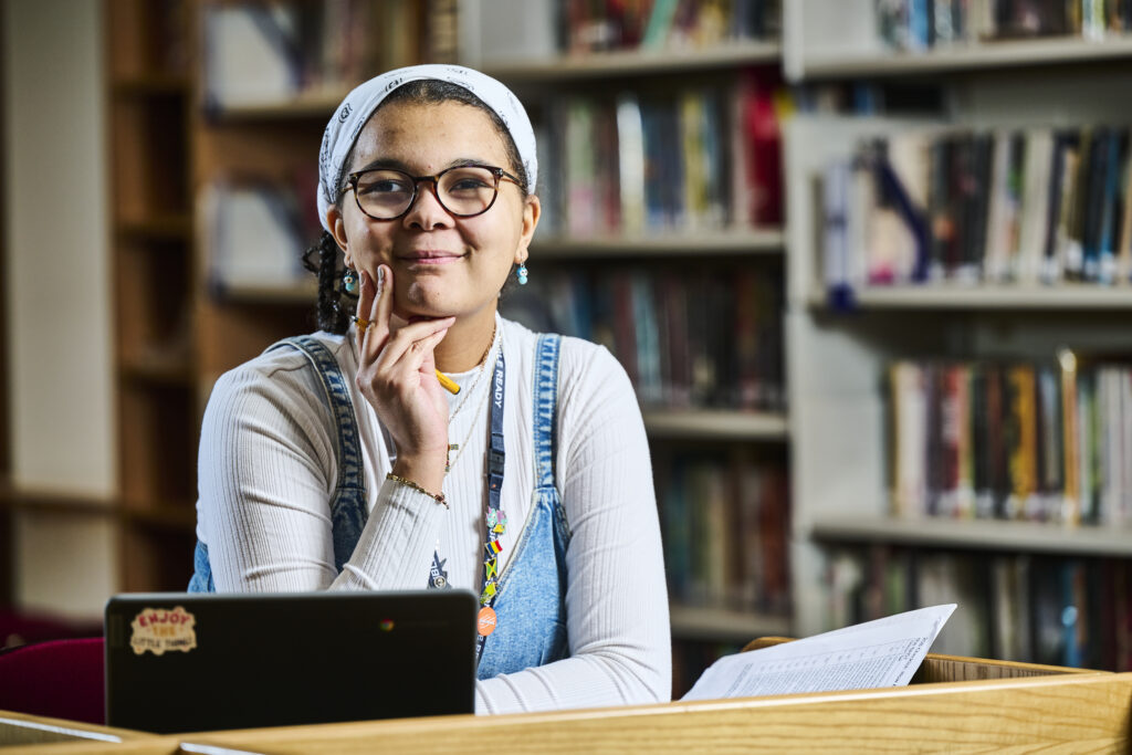 Female student sitting at computer