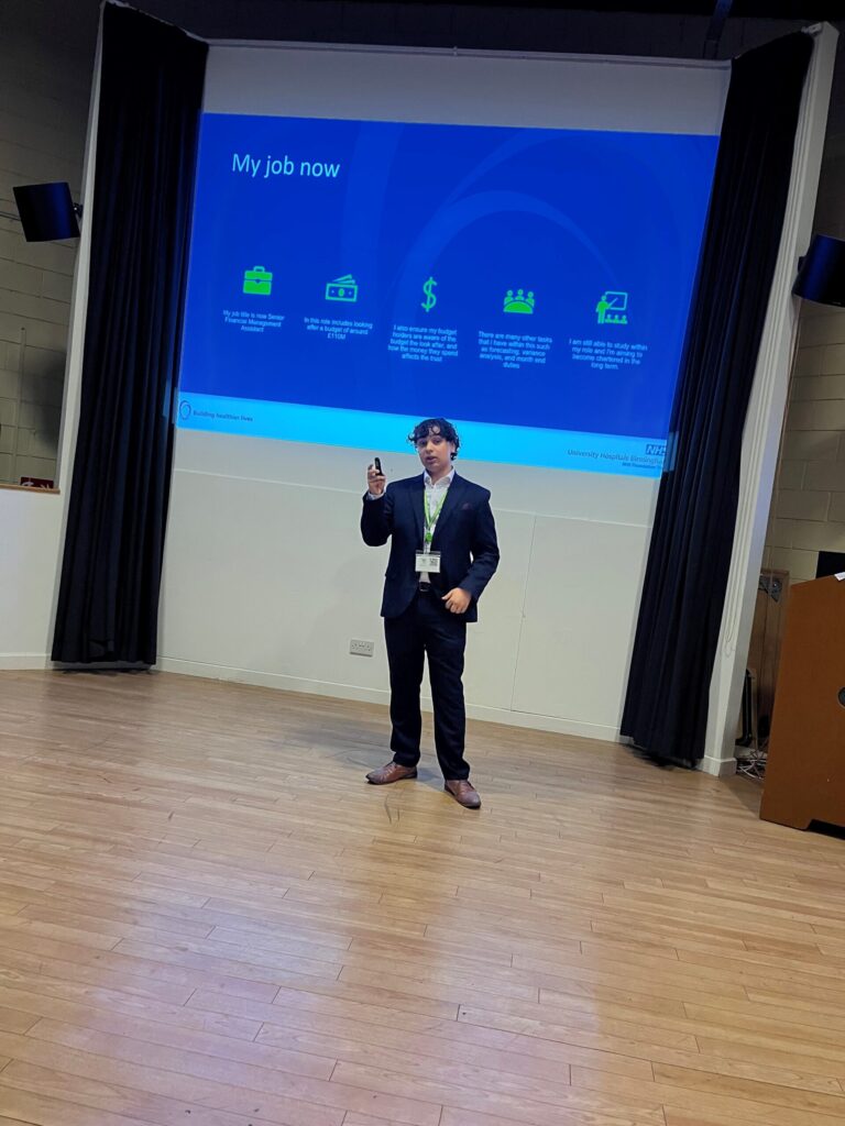 Former finance student Diazan giving a careers talk