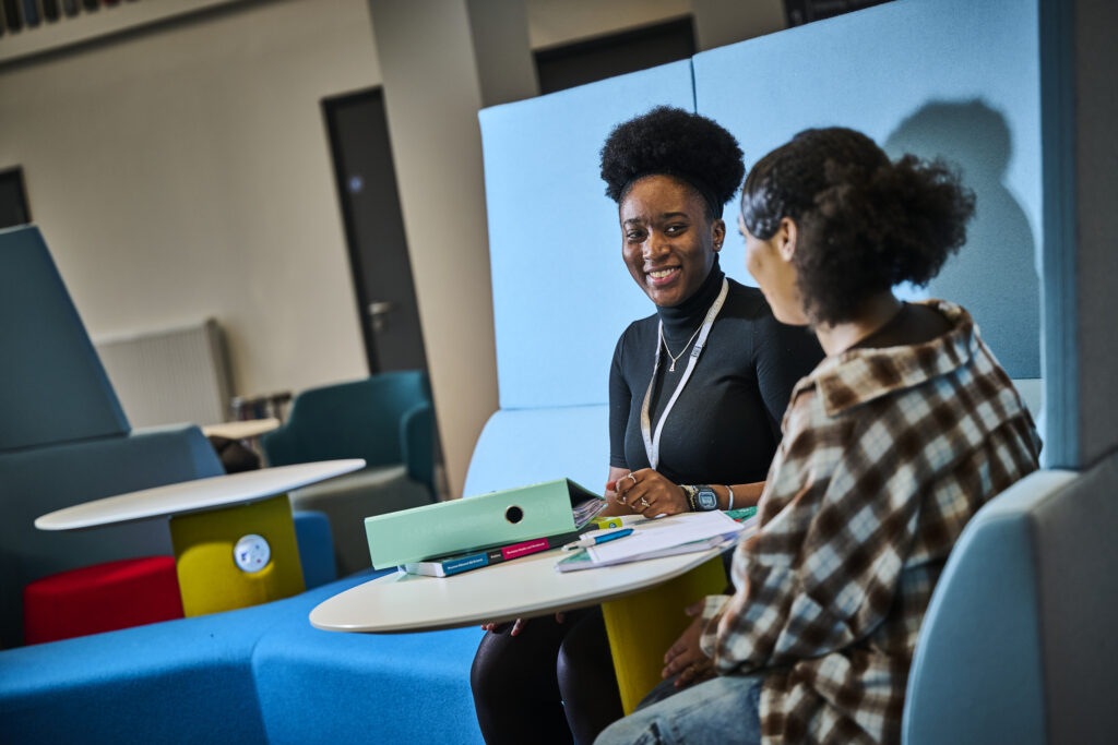 Student support officer helping student