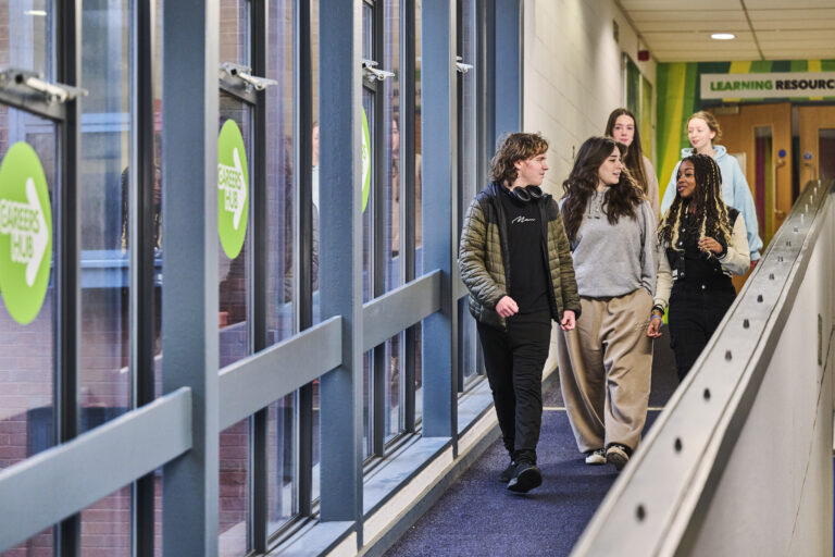 Students walking down a ramp