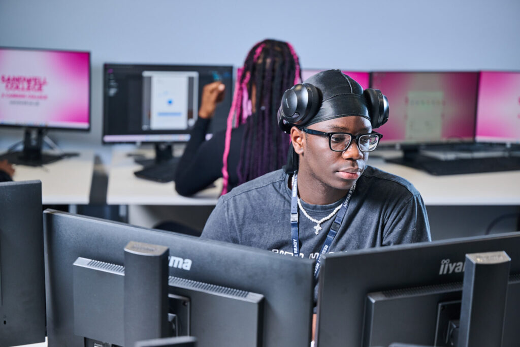 Student with headphones on in classroom