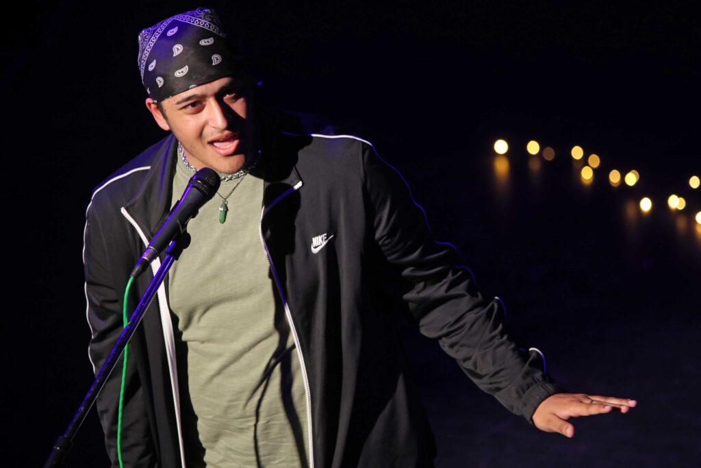 Student singing at performance