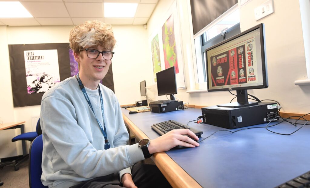 Graphics student working on computer