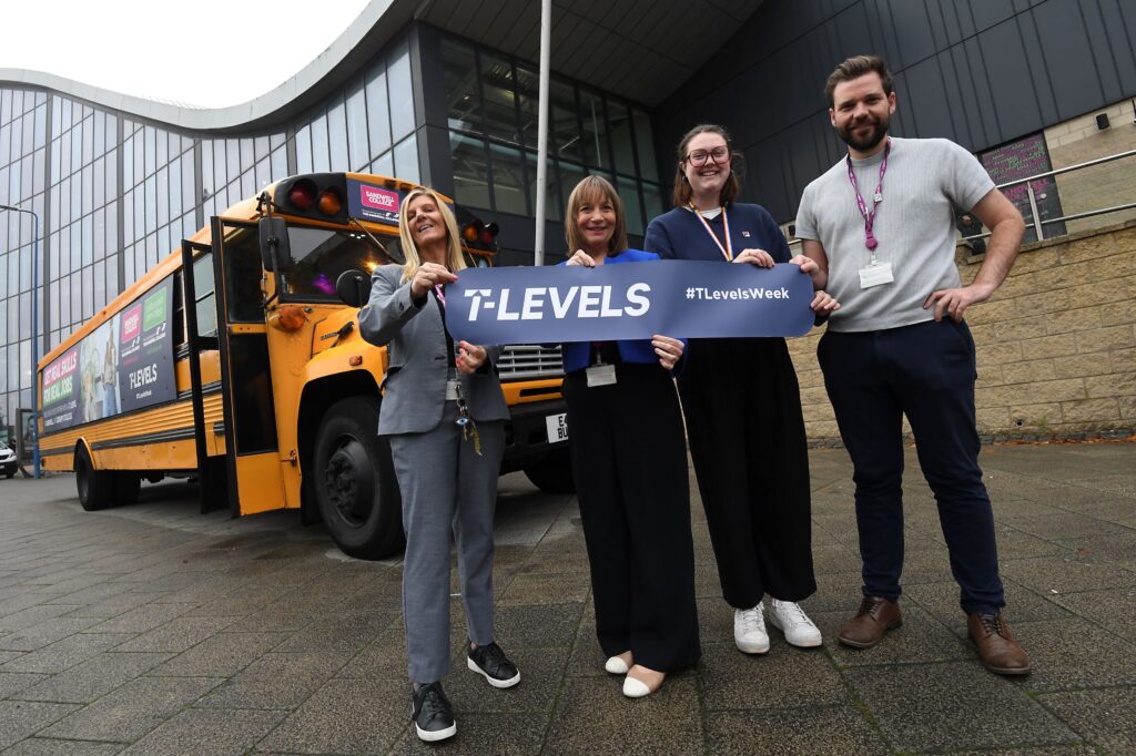 Cadbury staff with the Principal in front of T Level bus